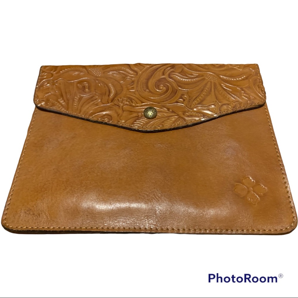 Brown saddle bag, leather embossed